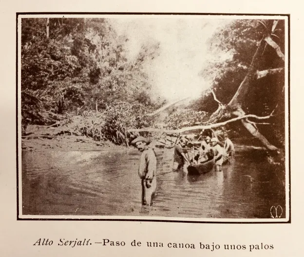 Upper Serjali river, the pass of a canoe through a few fallen trees.